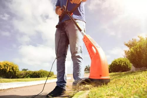 Bordeadora Eléctrica Tramontina 1000w + Escoba Rastrillo Color Naranja