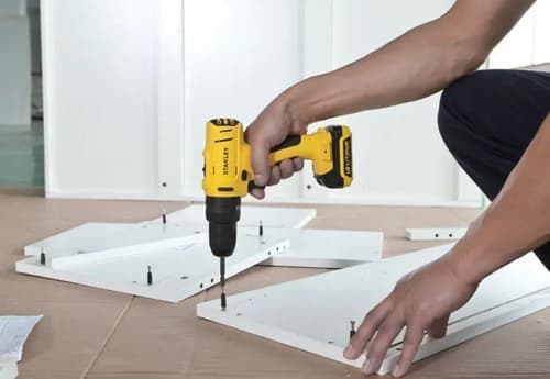Taladro Percutor Atornillador Inalámbrico De 10mm Stanley Sch12s2k + Accesorio Con Maletín De Transporte Amarillo