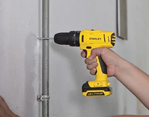 Taladro Percutor Atornillador Inalámbrico De 10mm Stanley Sch12s2k + Accesorio Con Maletín De Transporte Amarillo